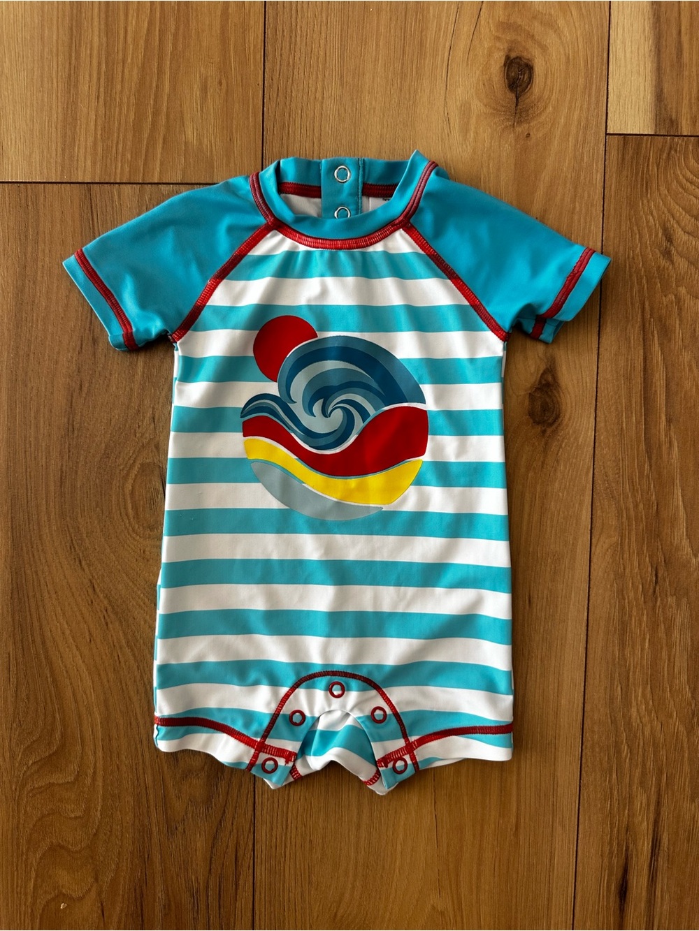 Turquoise Stripe Kids Swim Romper with Wave Graphic